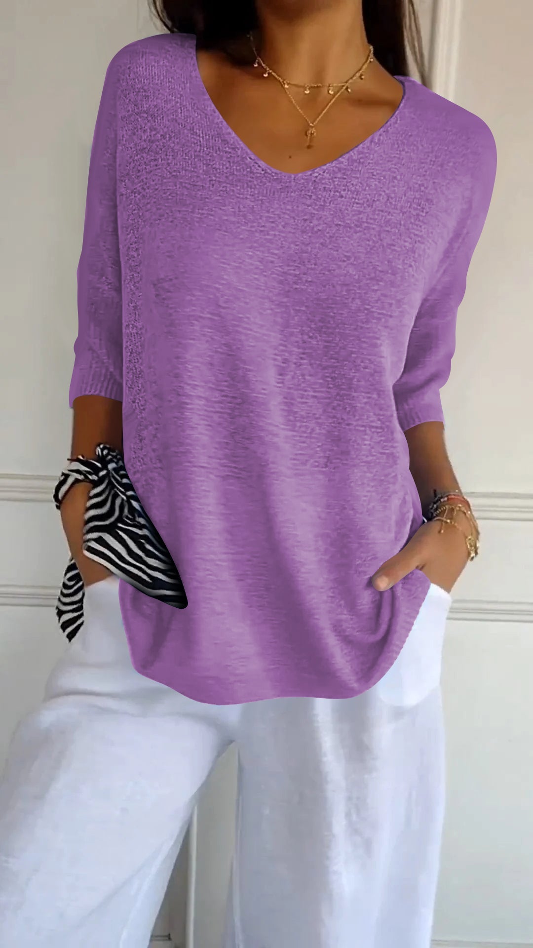 Kinsley - Plain-coloured knitted top with V-neckline